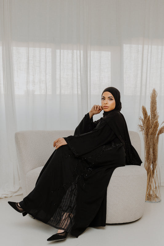 Nidha Abaya